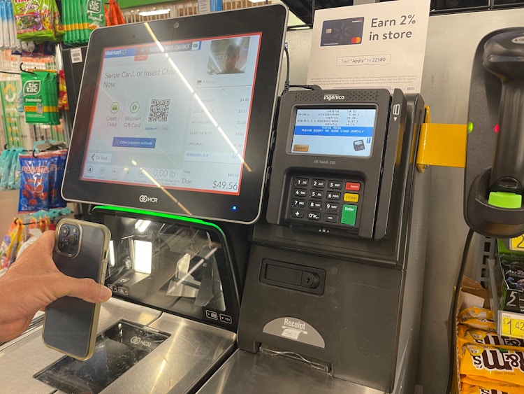 cellphone being scanned at walmart self check out