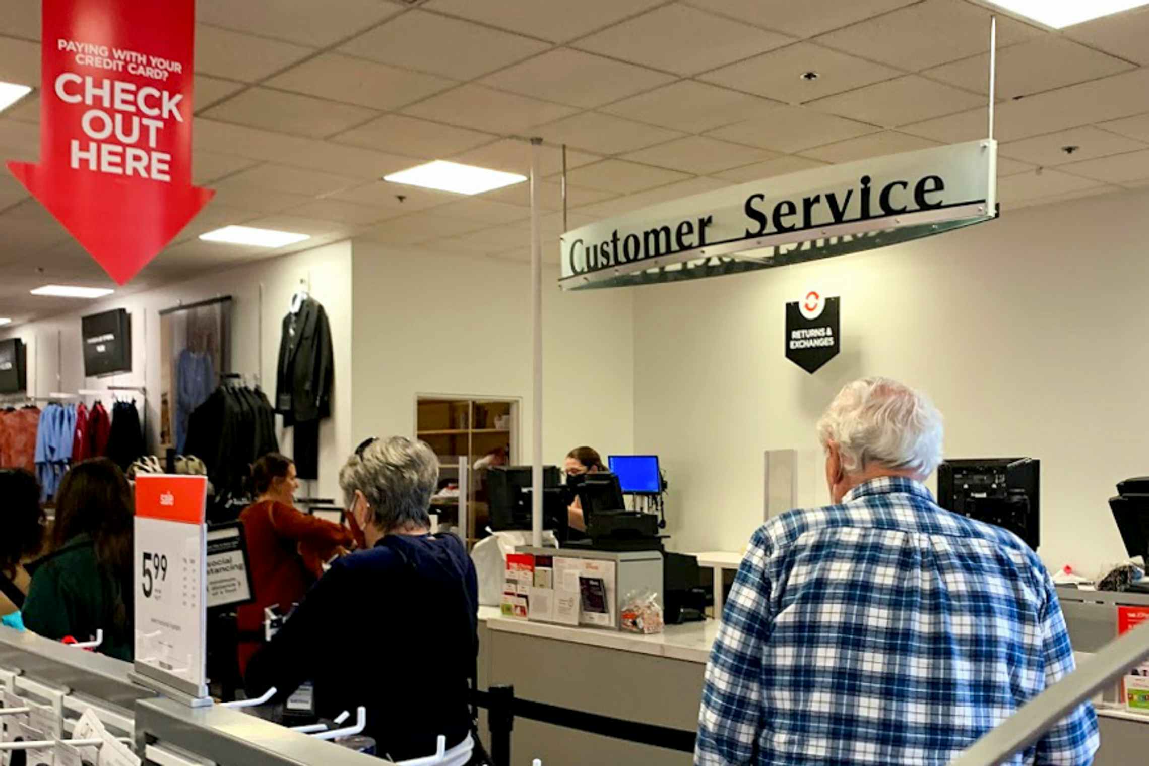 People standing in customer service line at jcpenney