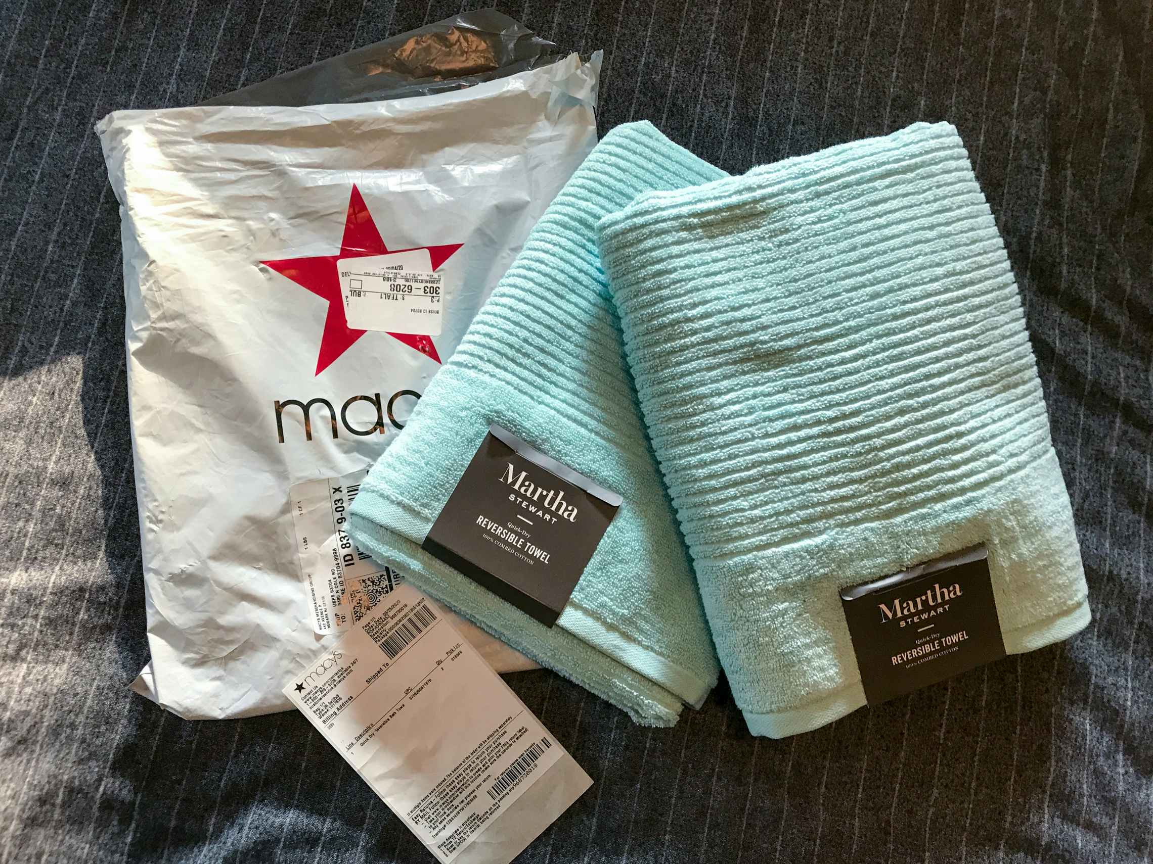 Macy's online order bag with two towels.