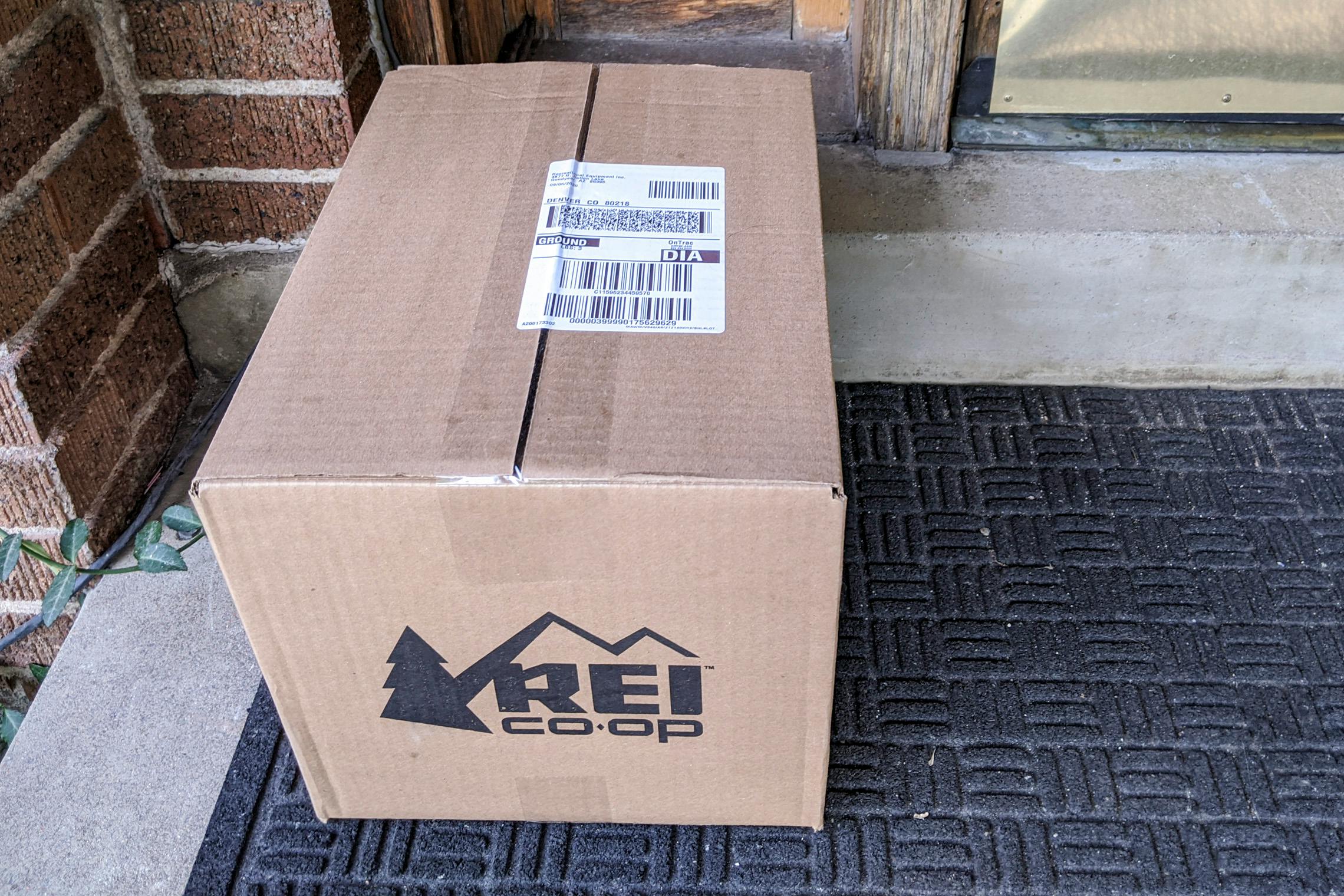 REI delivery box sitting on the front porch