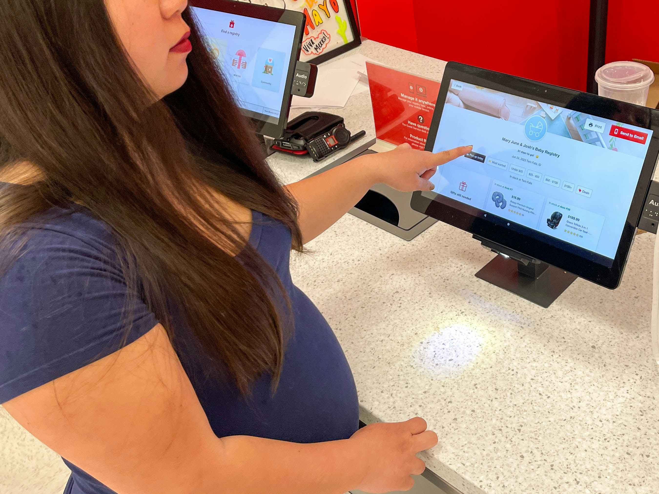 a close up for a woman on a target touch screen register