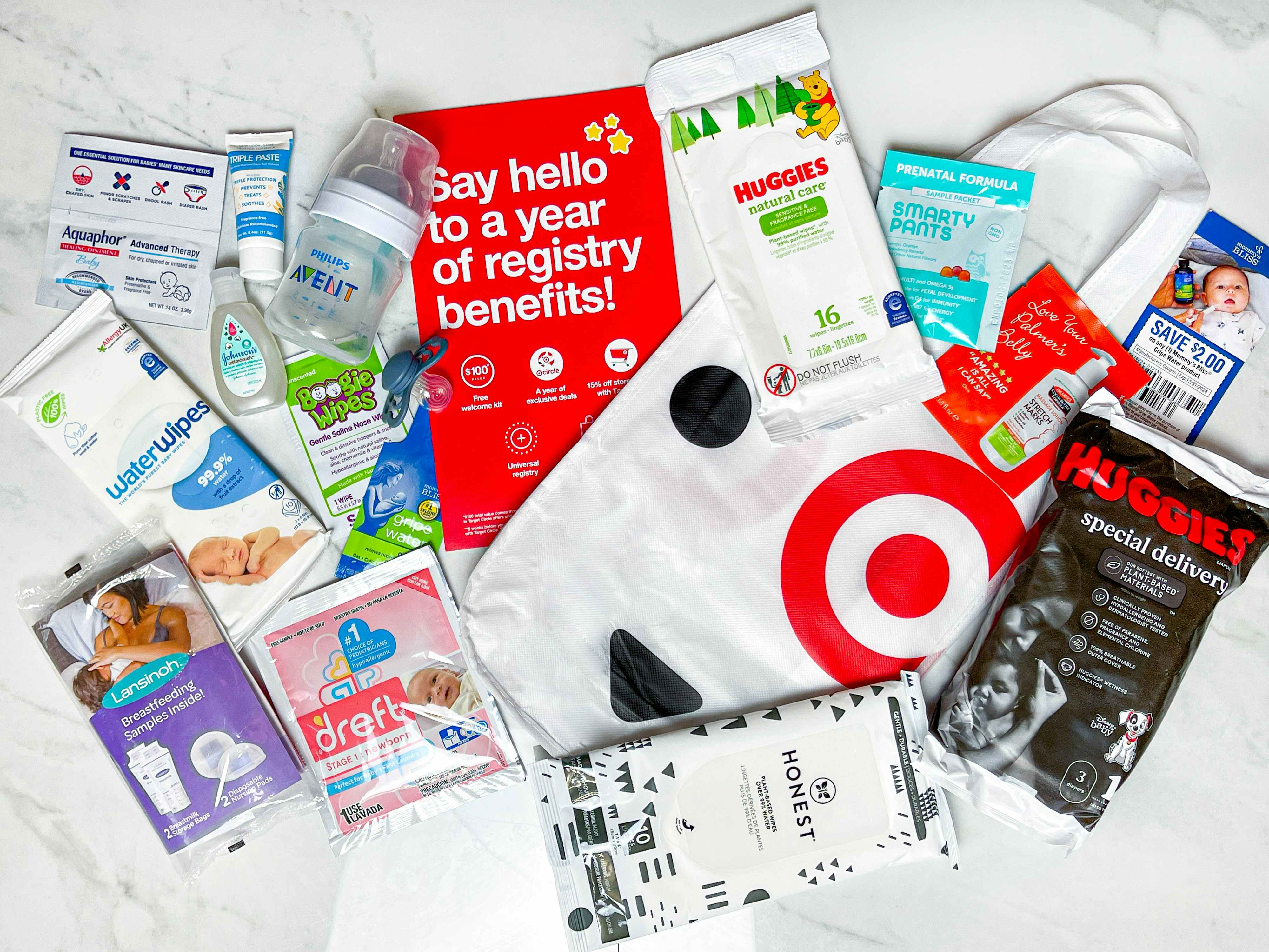 a target baby registry welcome bag with the contents layed out on a counter
