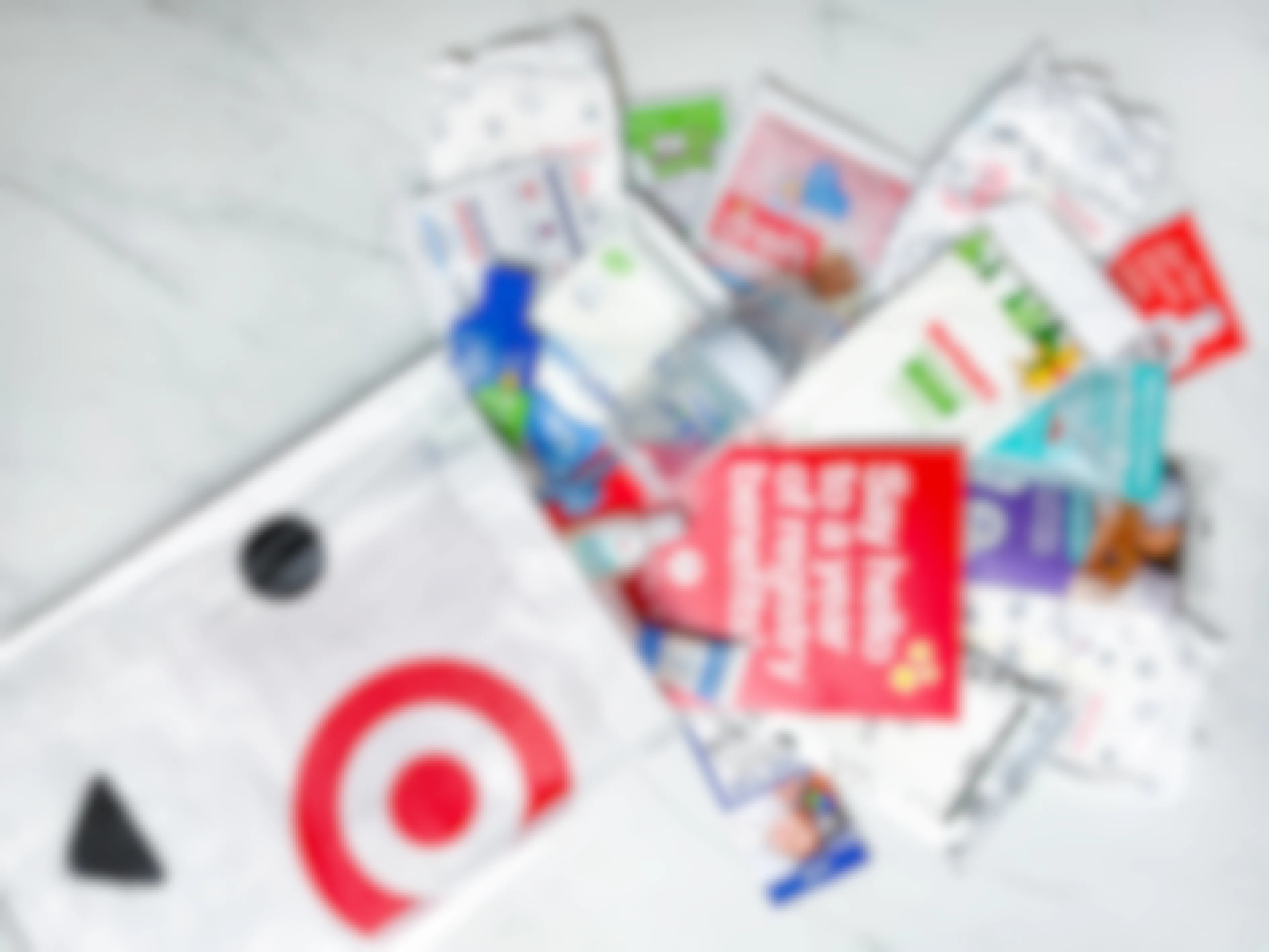 a target baby registry welcome bag with the contents layed out on a counter