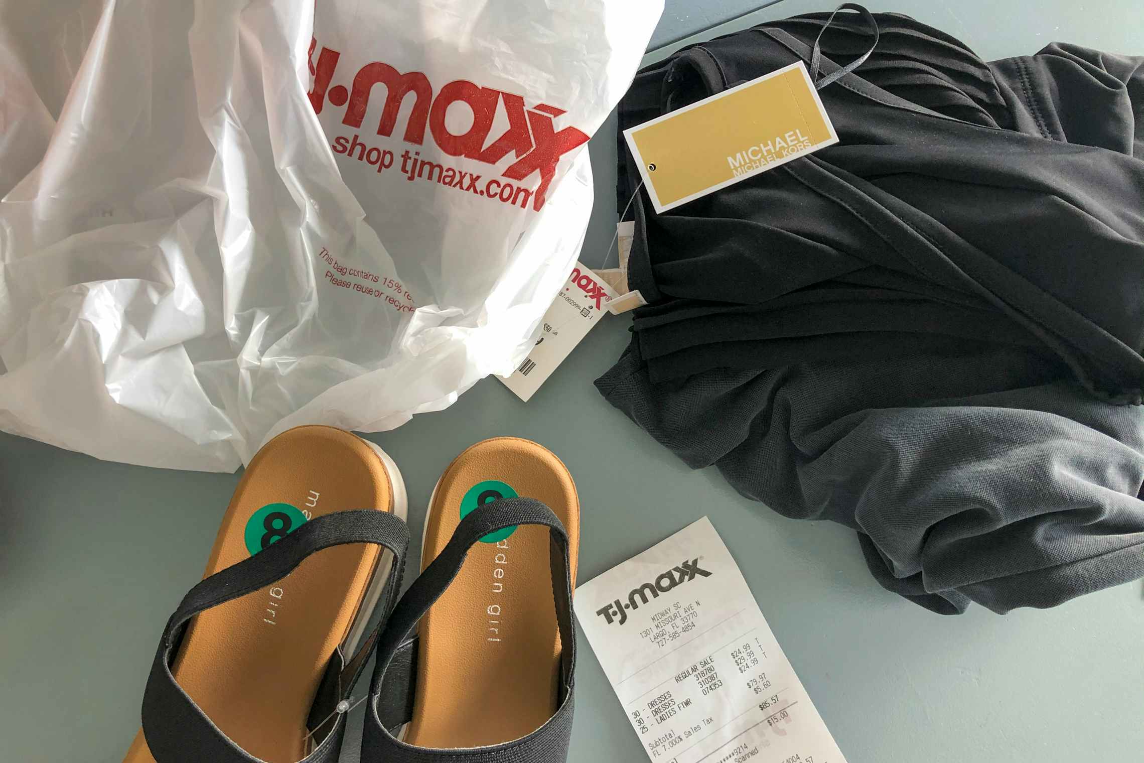 TJ Maxx shopping bag, receipt, shoes, and dress