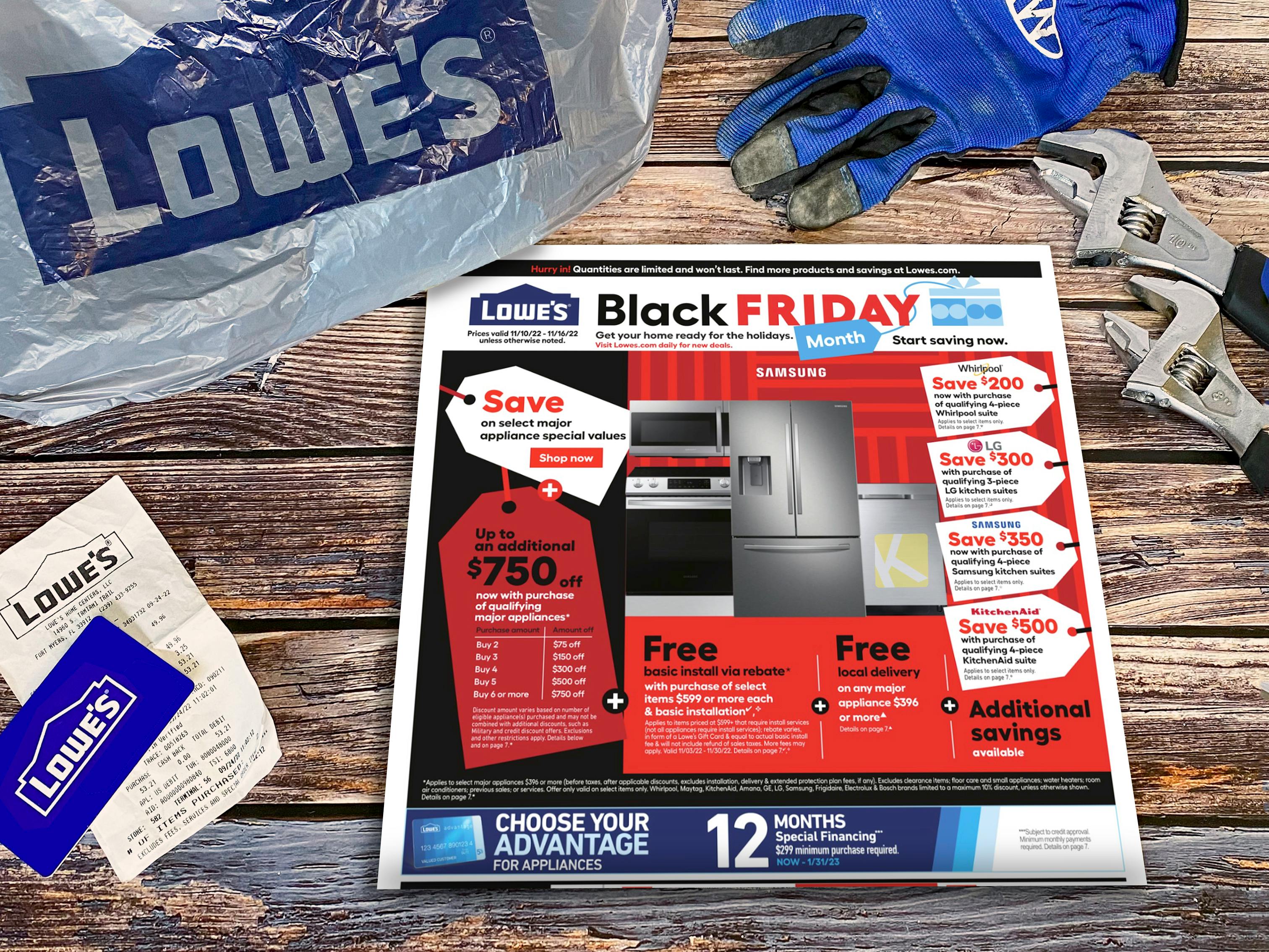 The Lowe's 2022 Black Friday advertisement on a table with a Lowe's bag, gift card, receipt, and some tools.