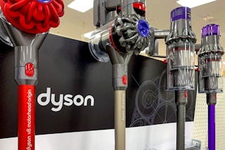A close up on some Dyson vacuums on a store display