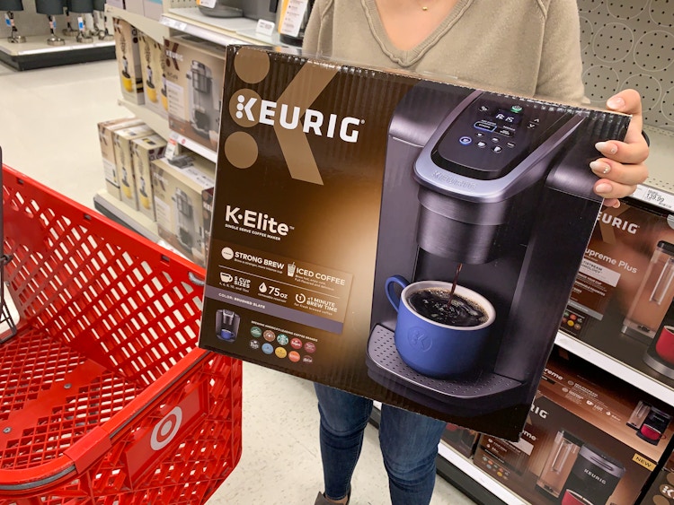 someone holding a keurig k elite at Target