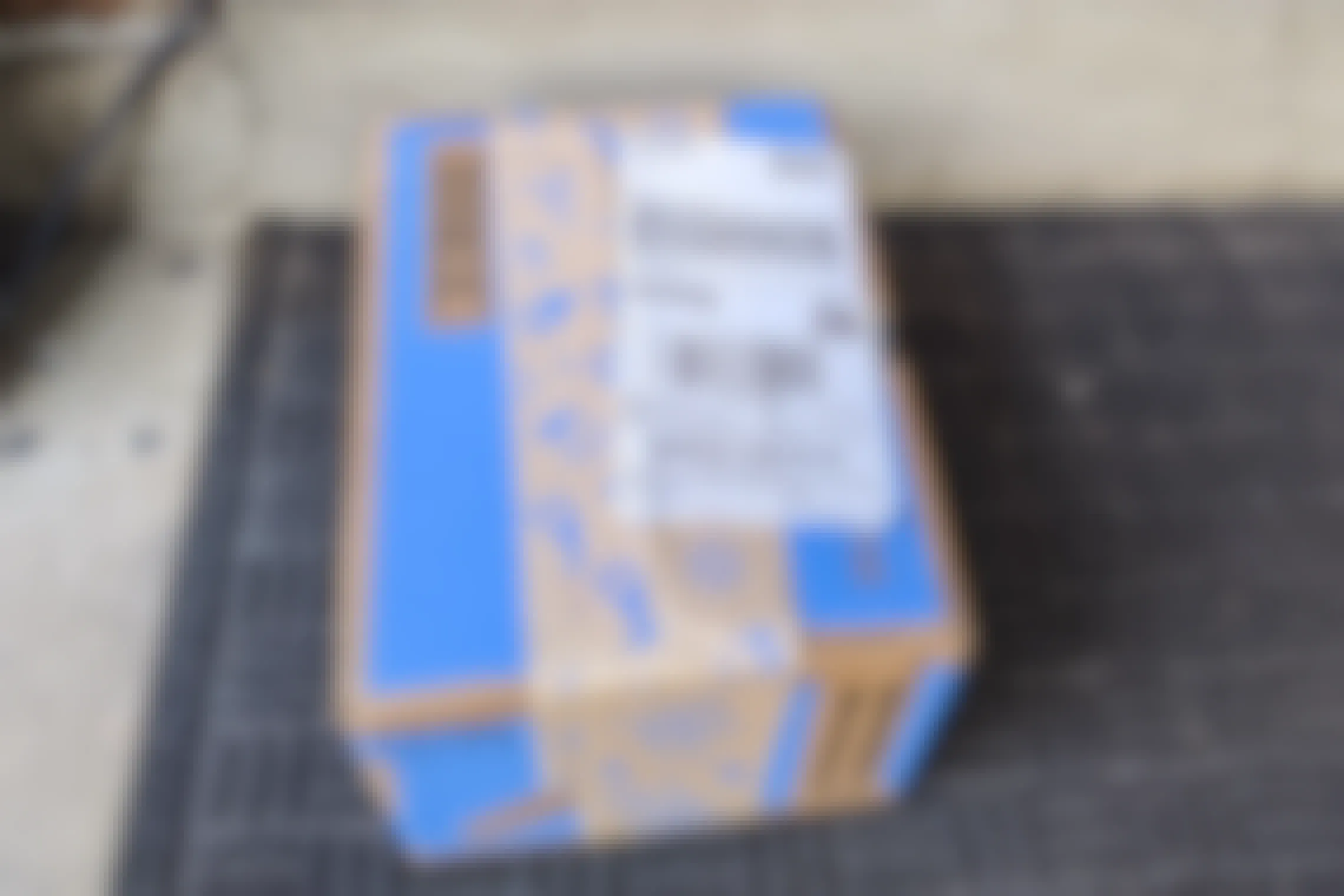 A Walmart package sitting on a doorstep