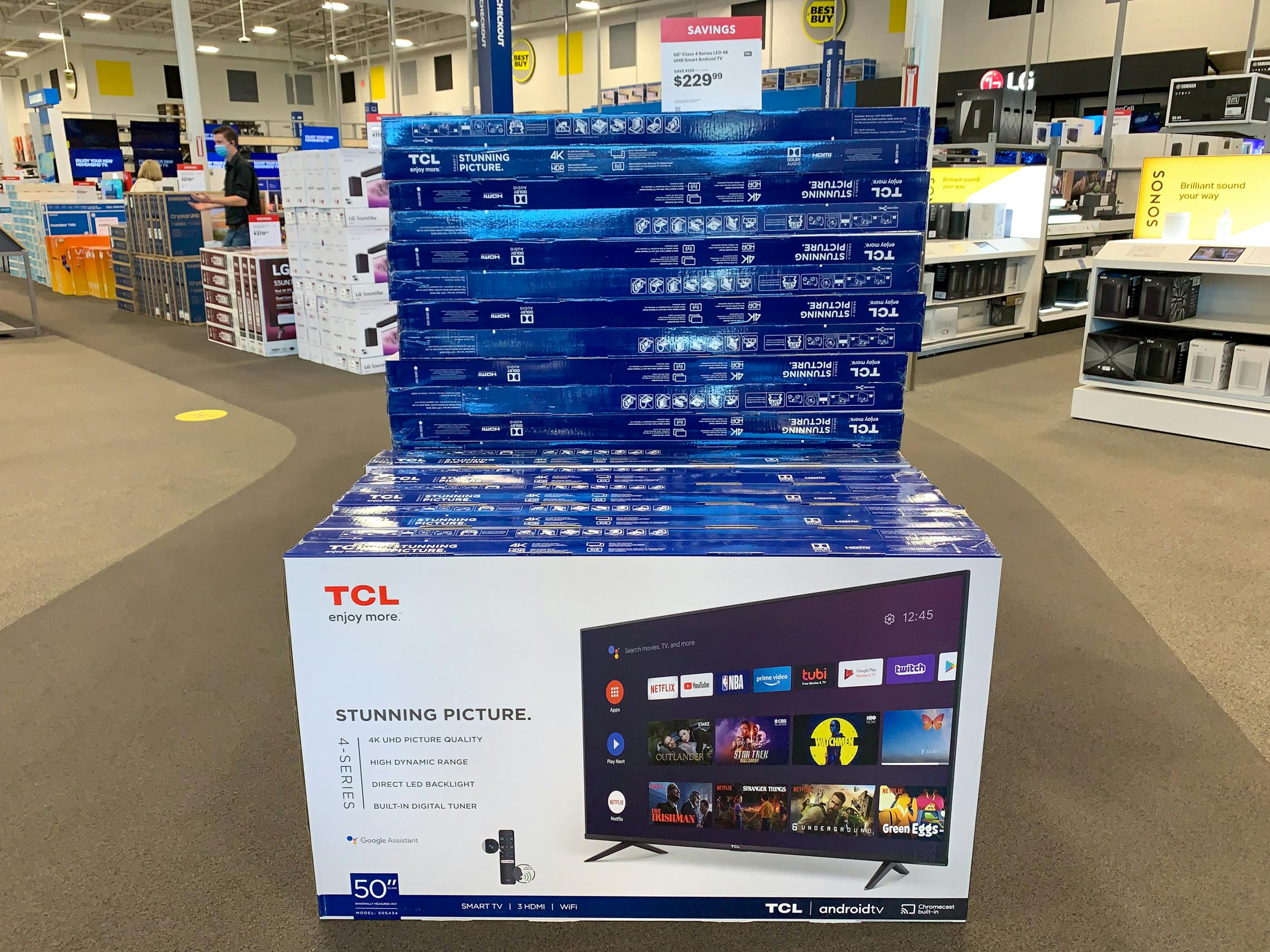 50-inch TCL TVs stacked up in the Best Buy store on sale for $229