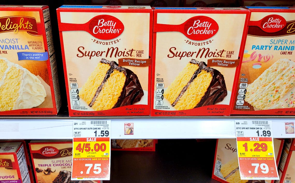Boxes of Betty Crocker cake mix stocked on a shelf with price tags of 79 cents and 75 cents.