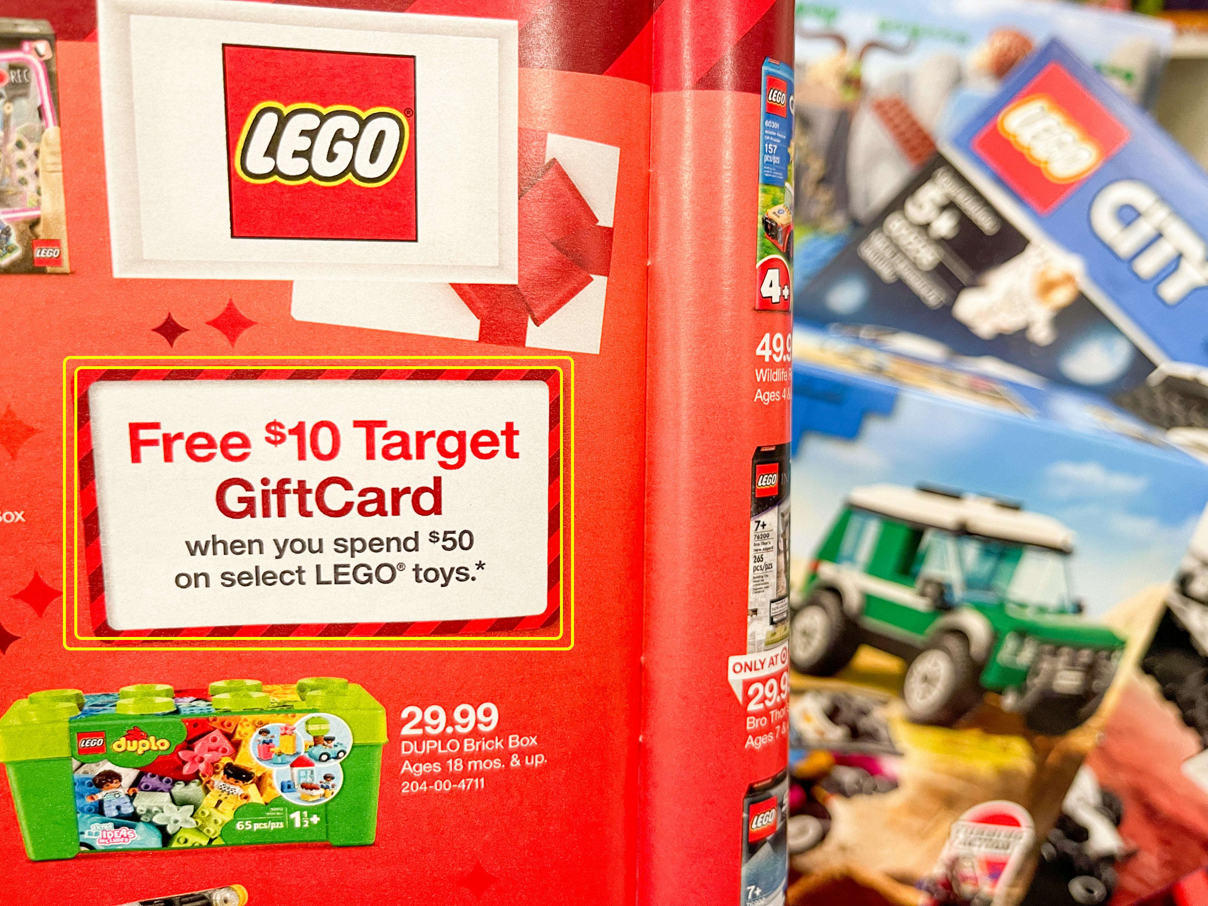 Info about a free Target gift card with lego purchase, circled in a Target toy book