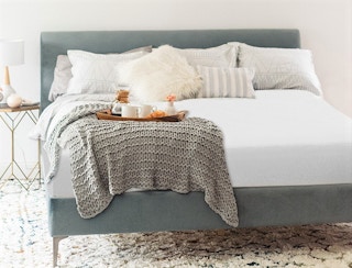 Verzey waterproof mattress protector on bed with tray