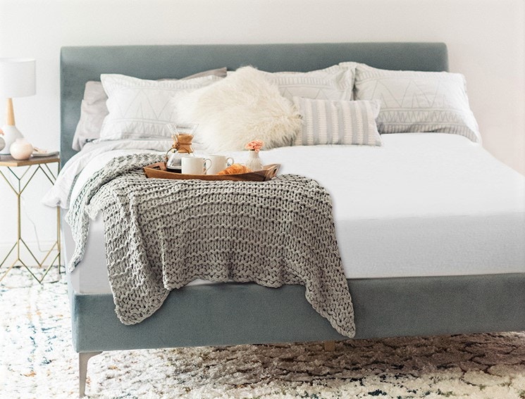 Verzey waterproof mattress protector on bed with tray