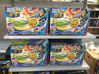 beyblade burst rise toys on a walmart shelf