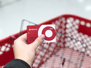 someone holding target redcard