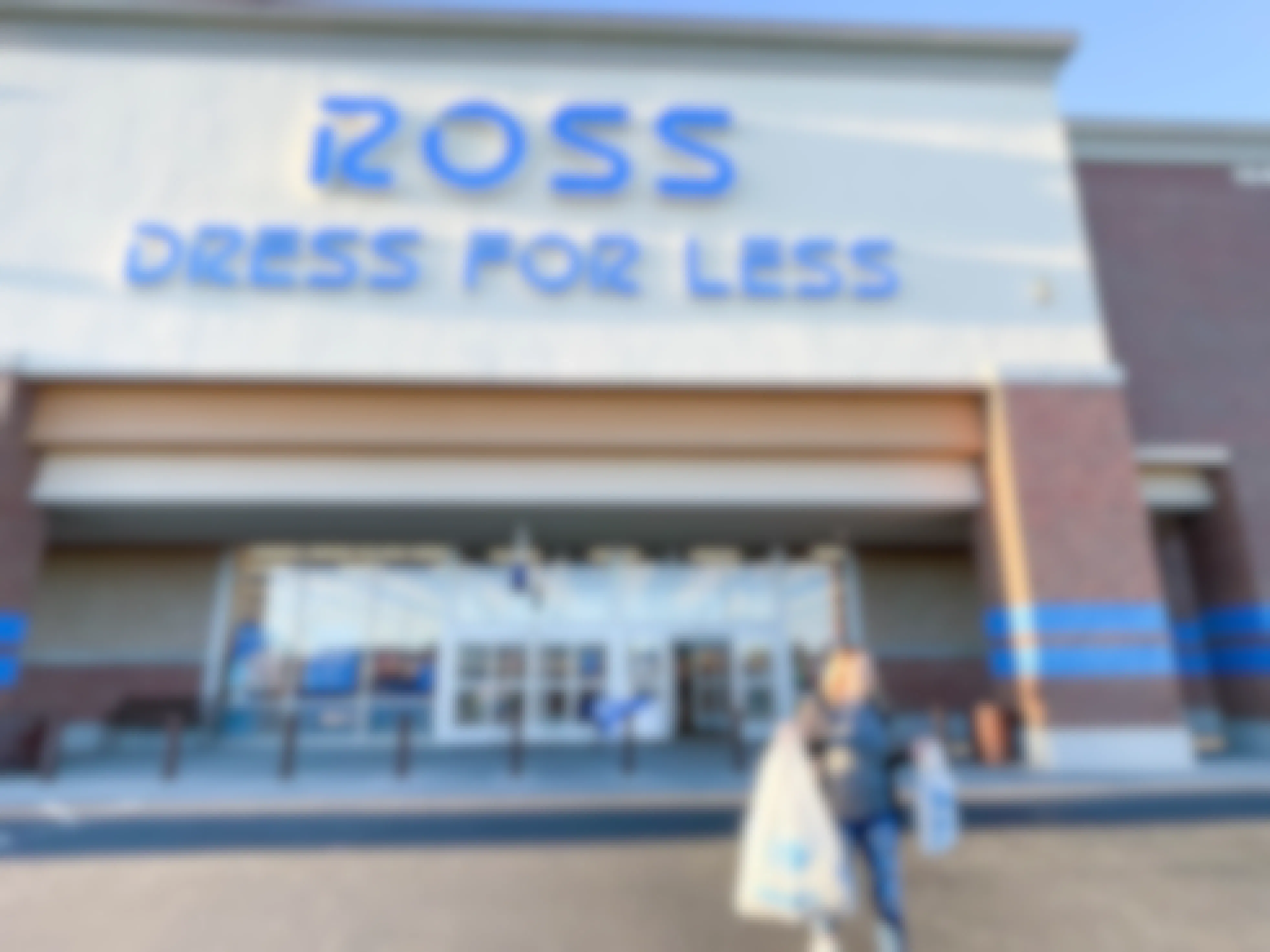 woman walking out of Ross dress for less store.