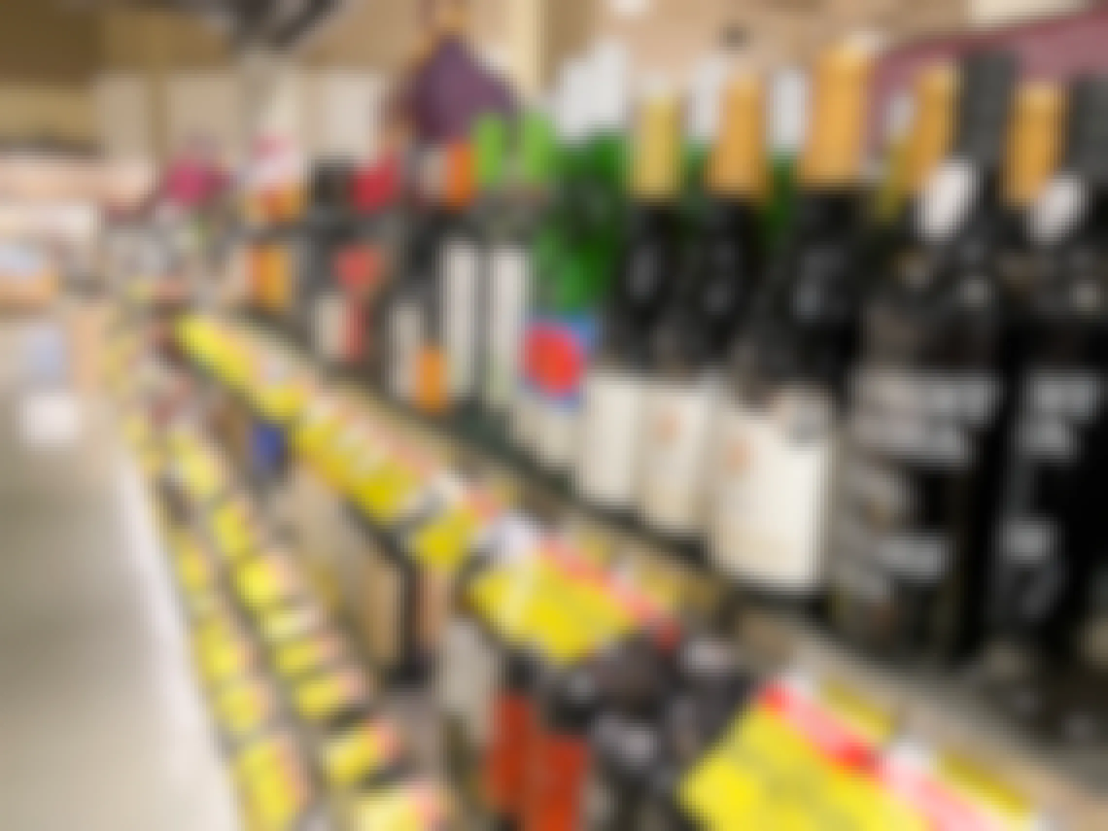 A grocery store aisle filled with wine