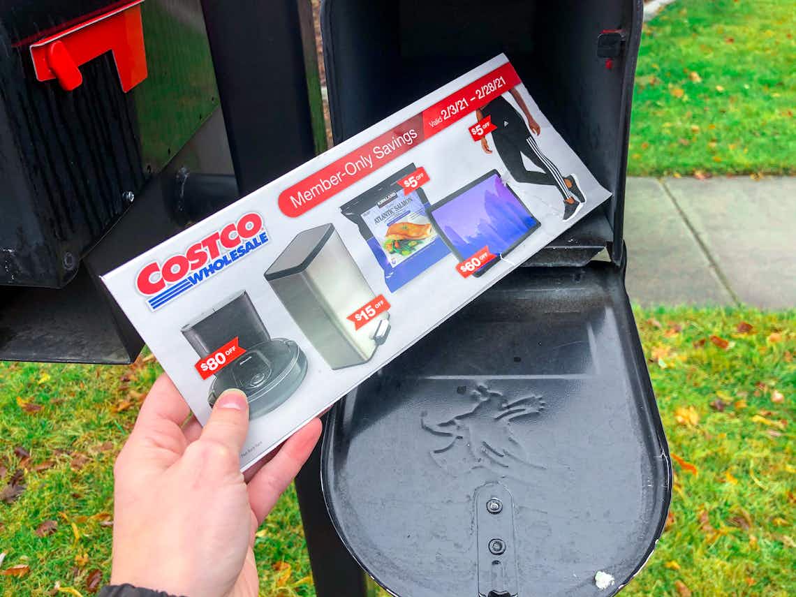 costco members only savings book coming out of a mailbox 