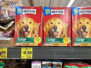 Boxes of Milk Bone dog treats on a shelf