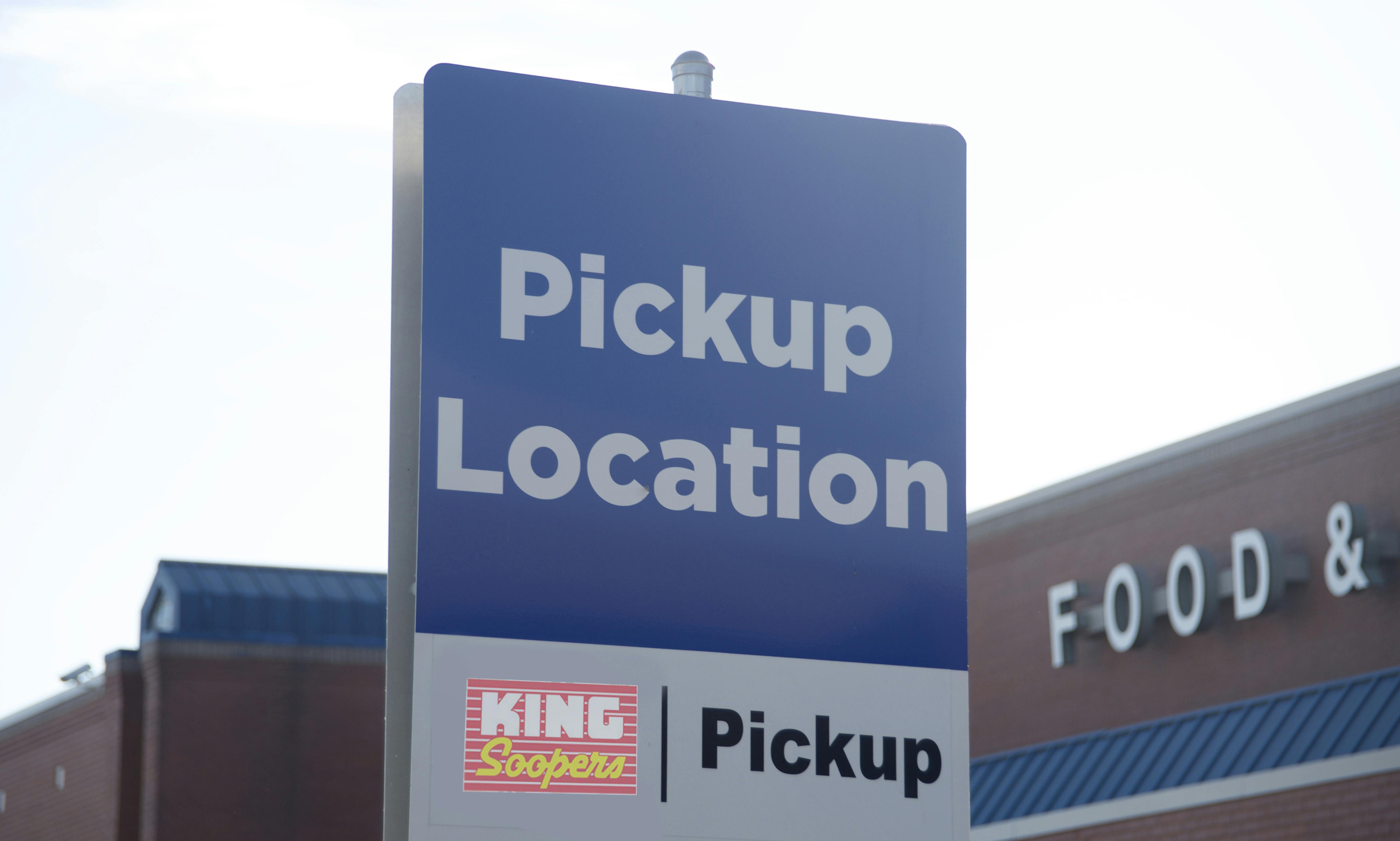 Pickup location sign outside a King Soopers grocery store.