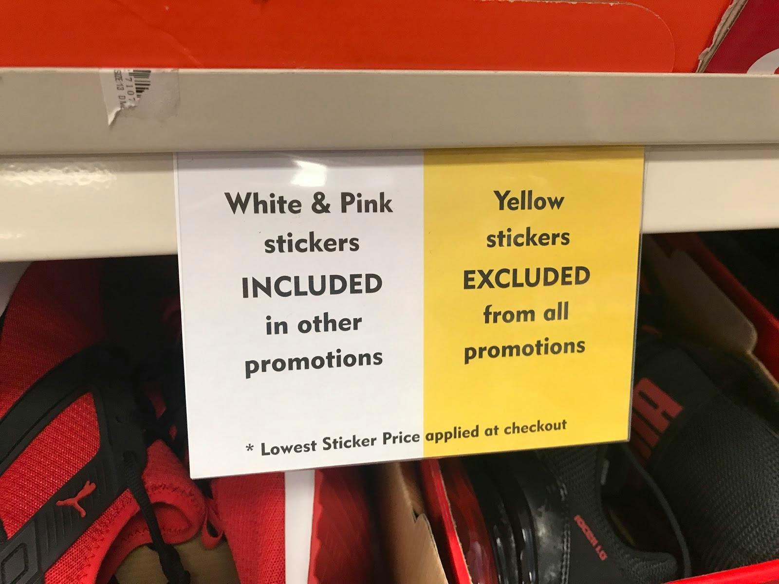 A white and yellow tag indicating coupon exclusions. 