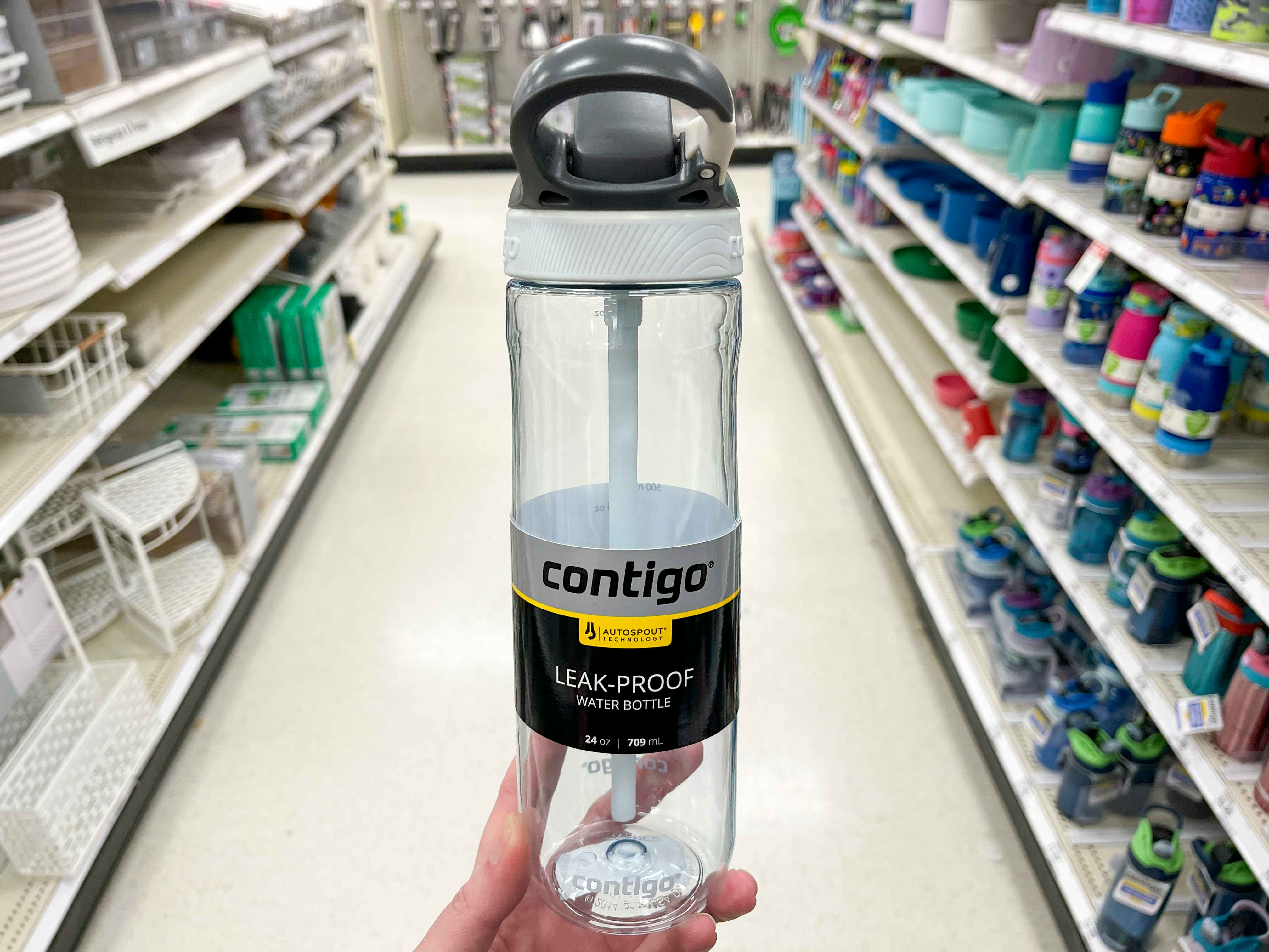 A person holding a contigo water bottle at Target.
