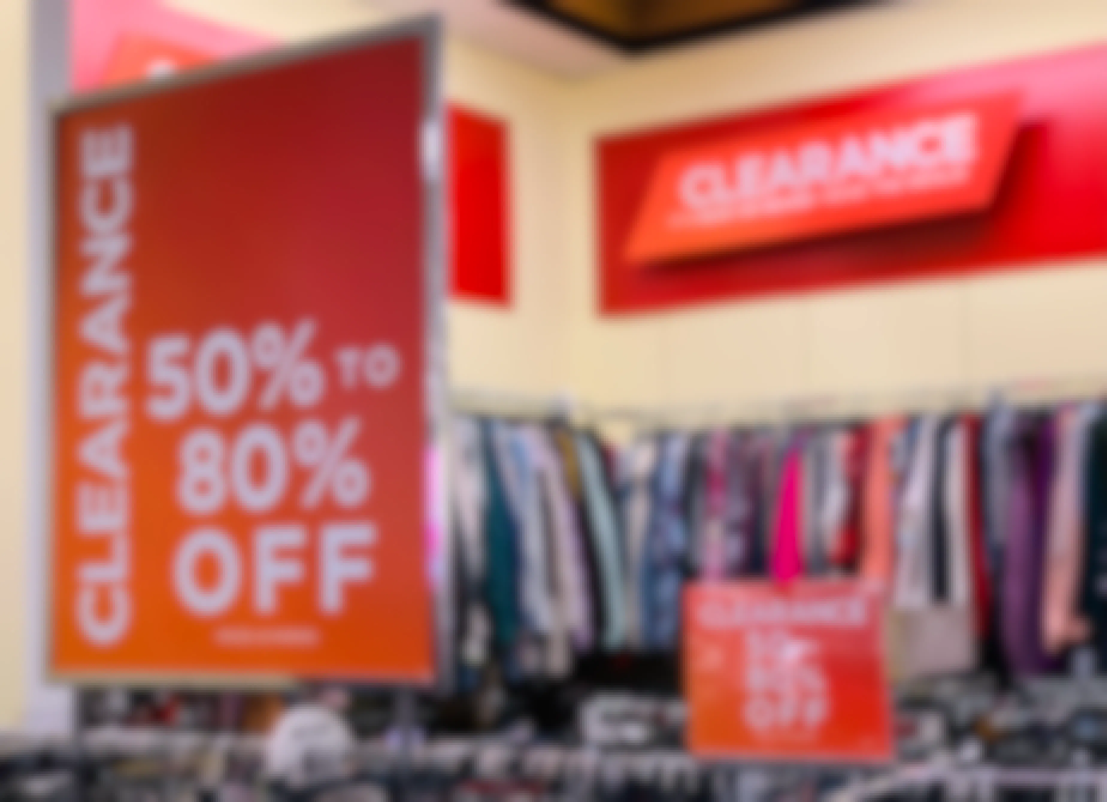Kohls in store clearance racks with 50% to 80% off signs