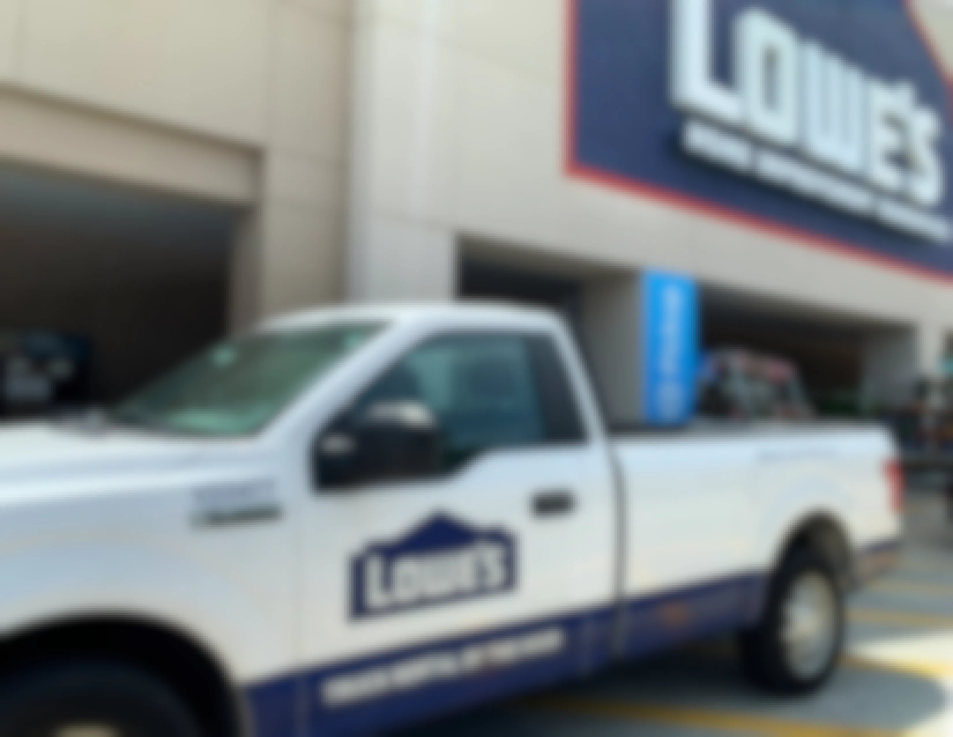 Lowe's rental truck parked infront of Lowe's store