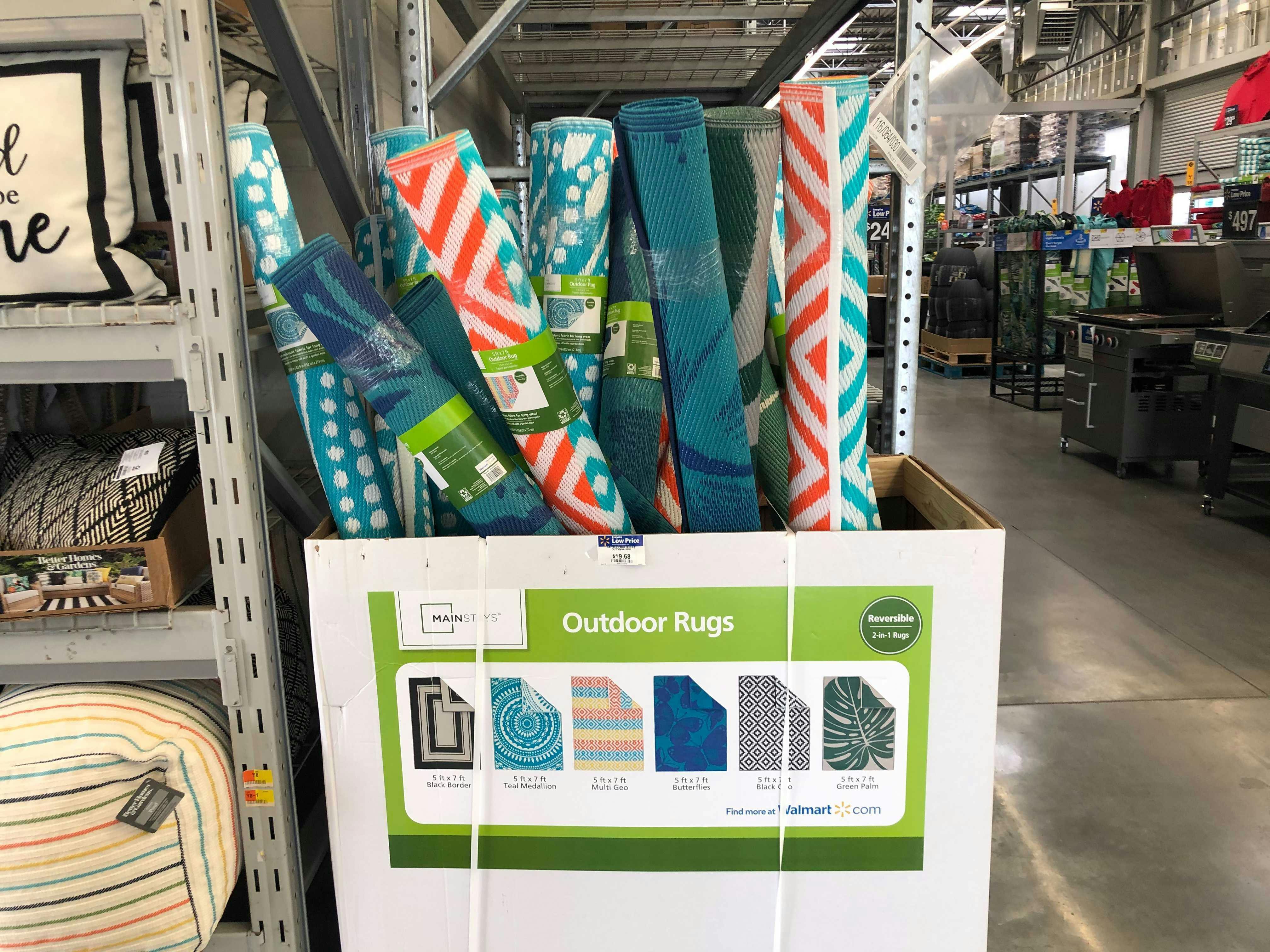 A store display box with outdoor rugs.