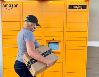 woman returning amazon package at locker