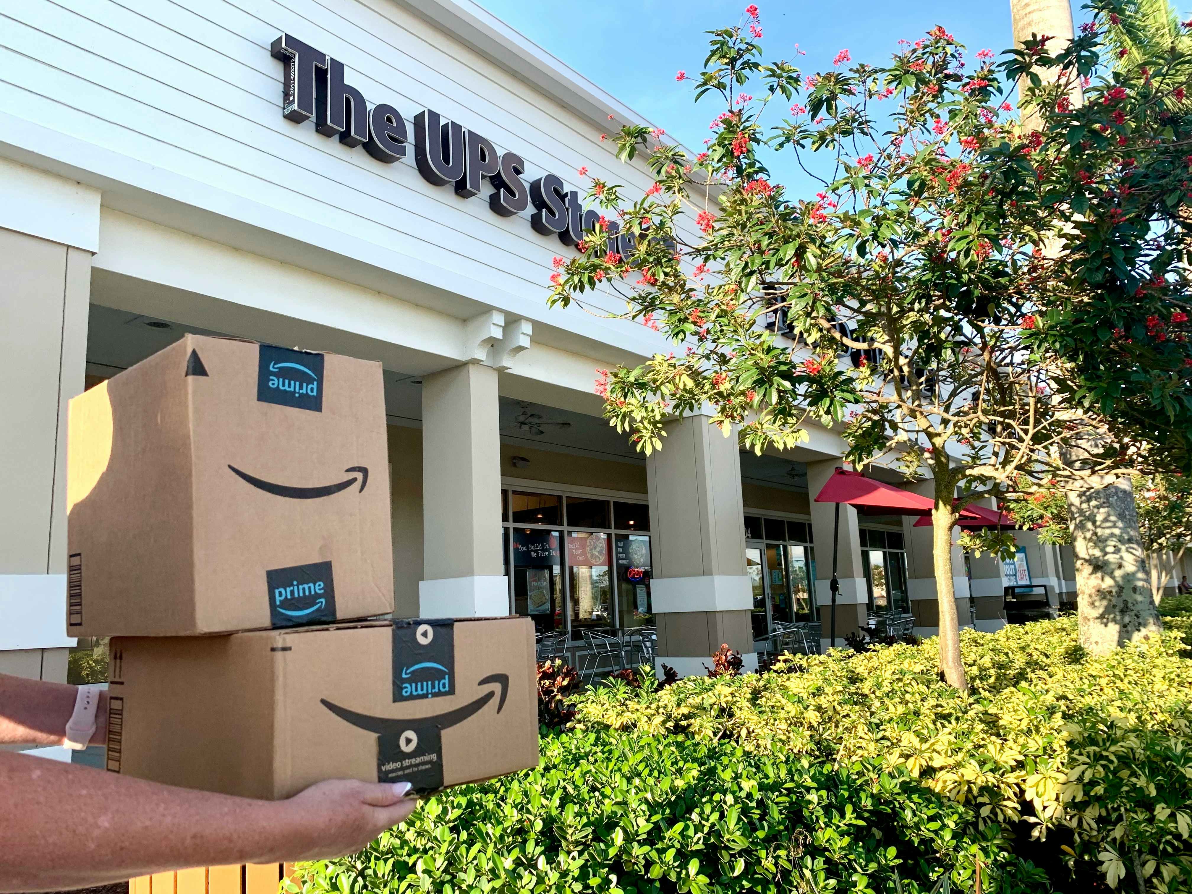 amazon boxes in front of ups store