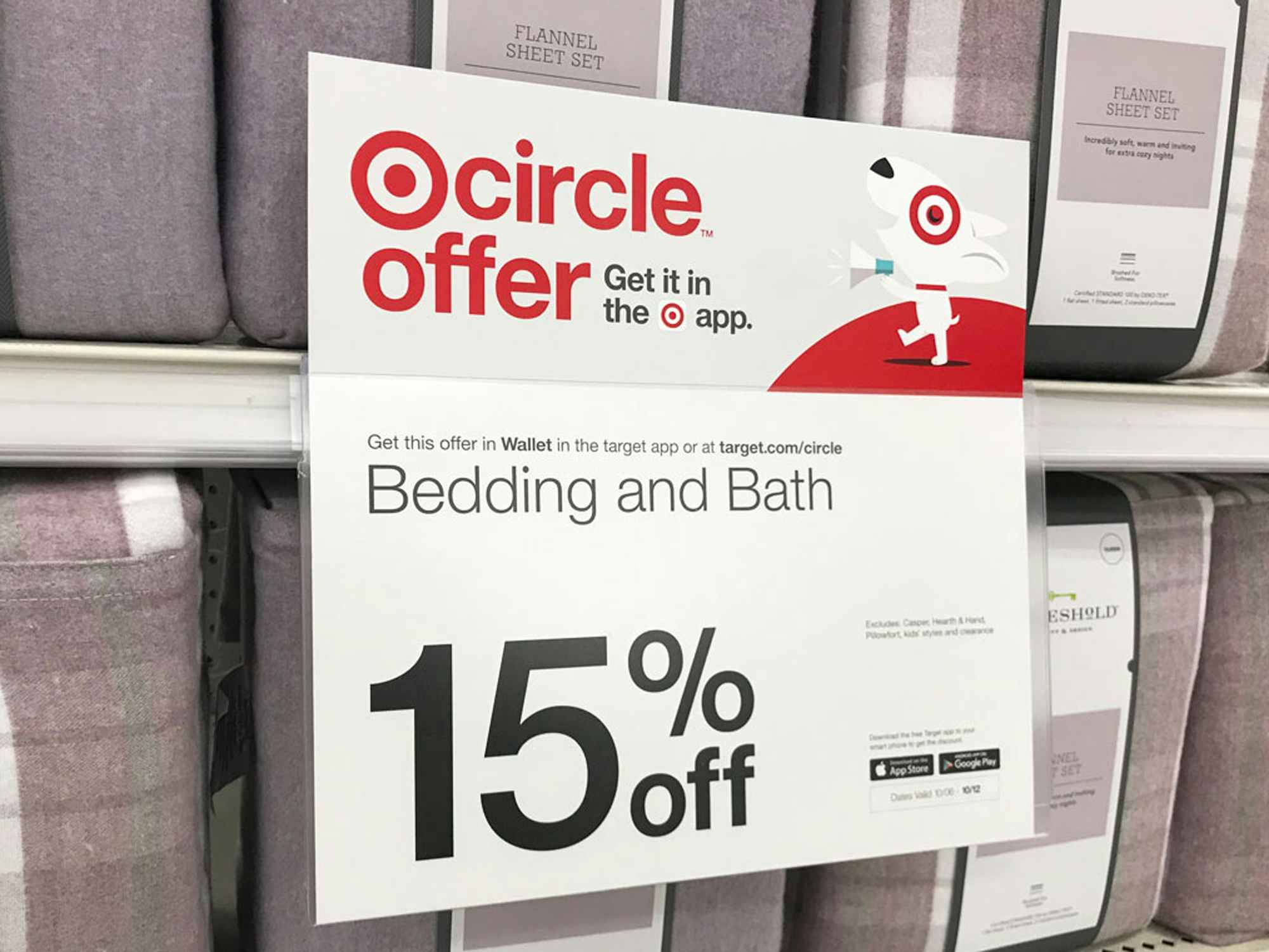 a 15 percent off bedding sign at target