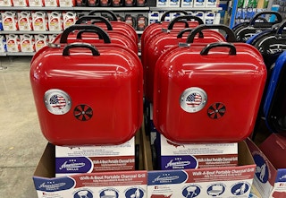 red portable grill display at a store