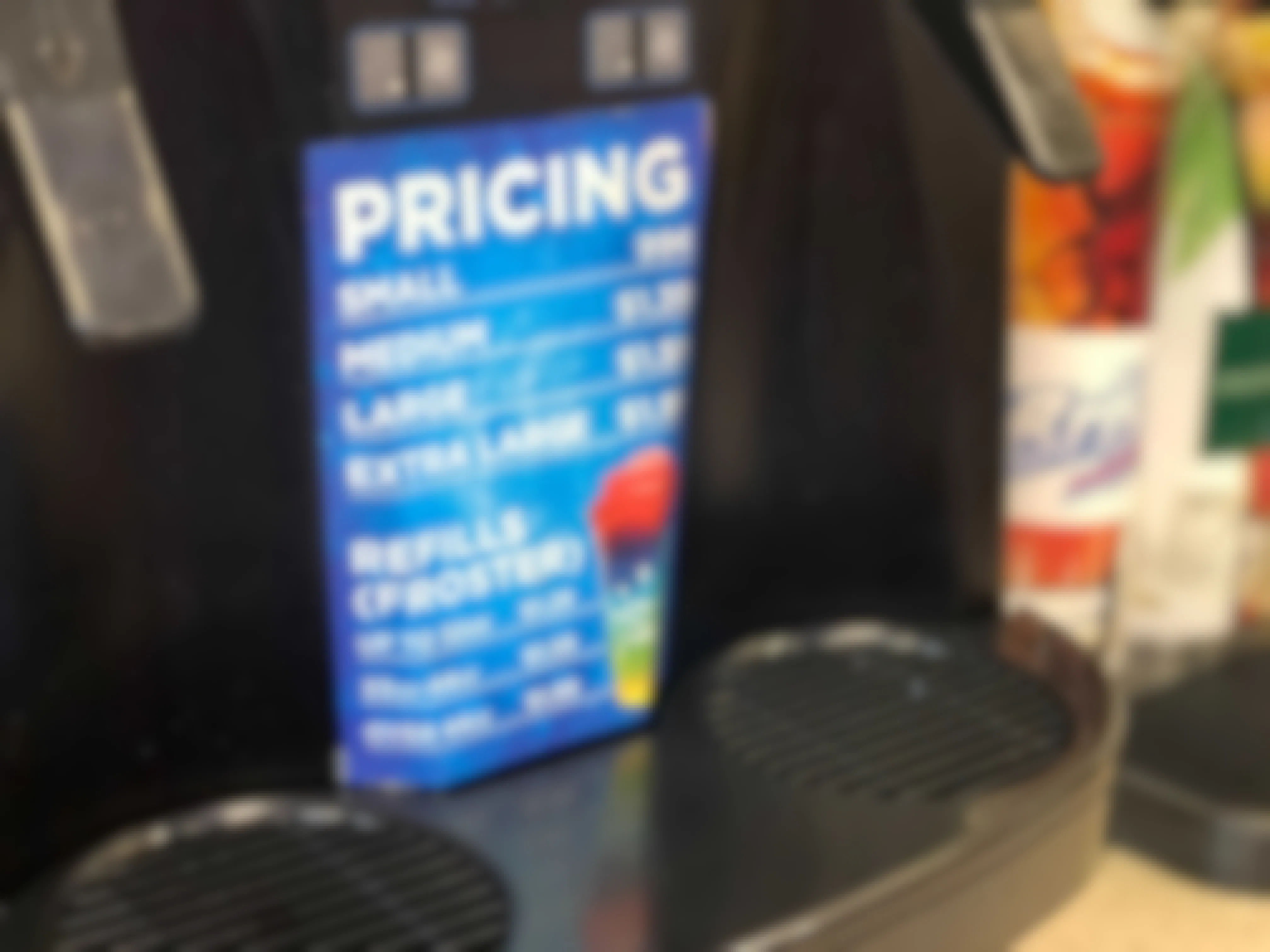 close up of the pricing for froster slushie drinks at circle k 