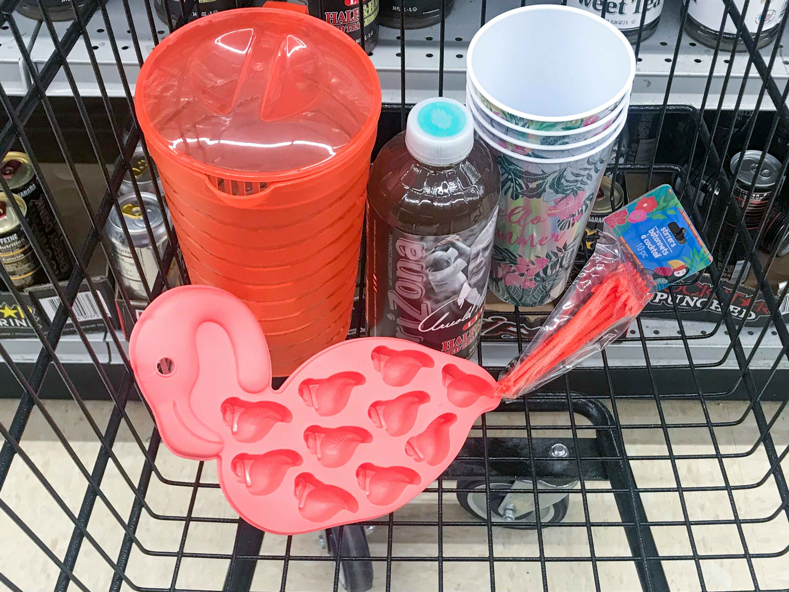 Ice tea, pitcher, cups, ice cube trey and, stir sticks in a cup at Dollar Tree.