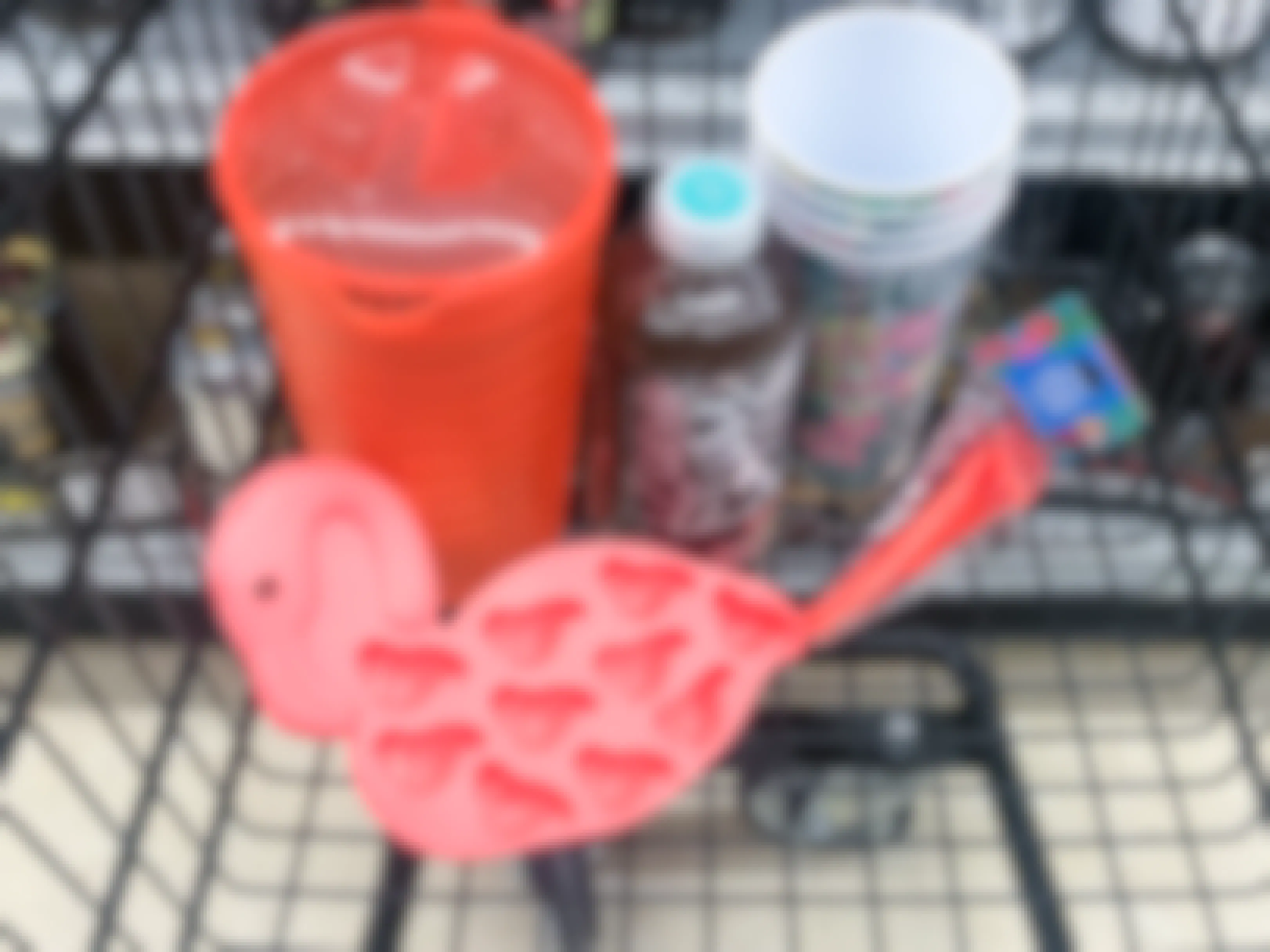 Ice tea, pitcher, cups, ice cube trey and, stir sticks in a cup at Dollar Tree.