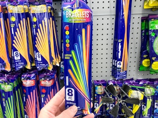 hand holding Dollar Tree glow sticks