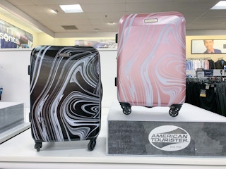 american tourister hardside spinner luggage display at kohls