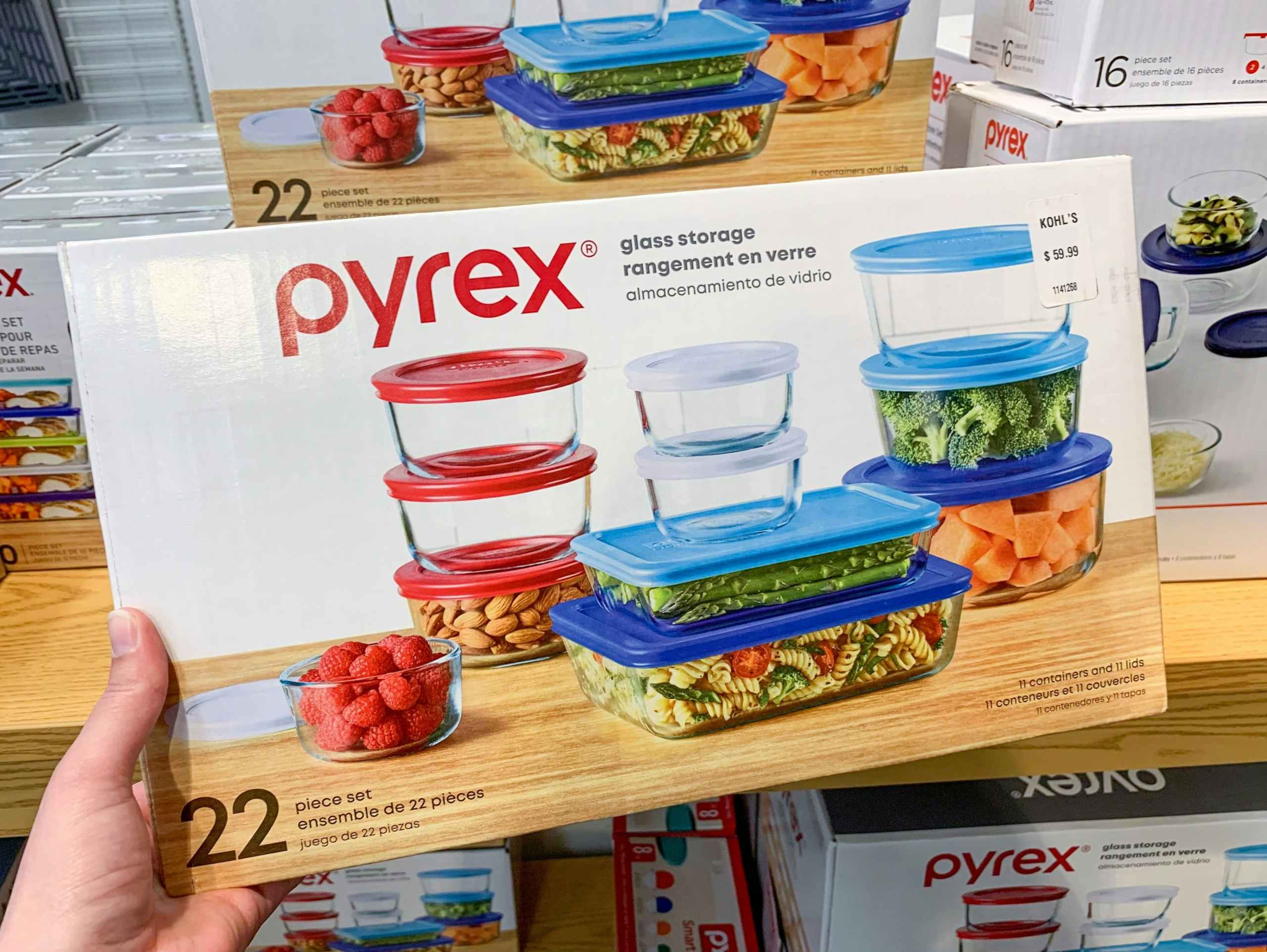 one pyrex box being held off the shelf