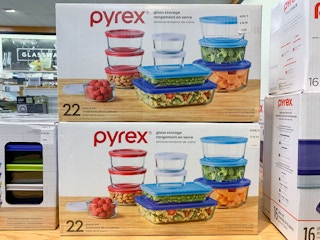 two pyrex boxes on shelf