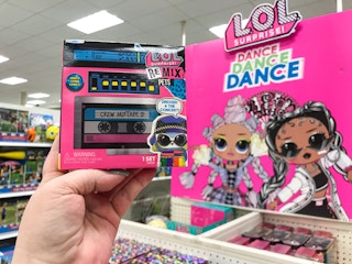 hand holding a lol surprise remix at Target