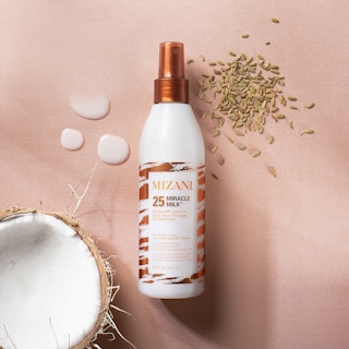 Bottle of Mizani Miracle Milk Leave-in Conditioner.