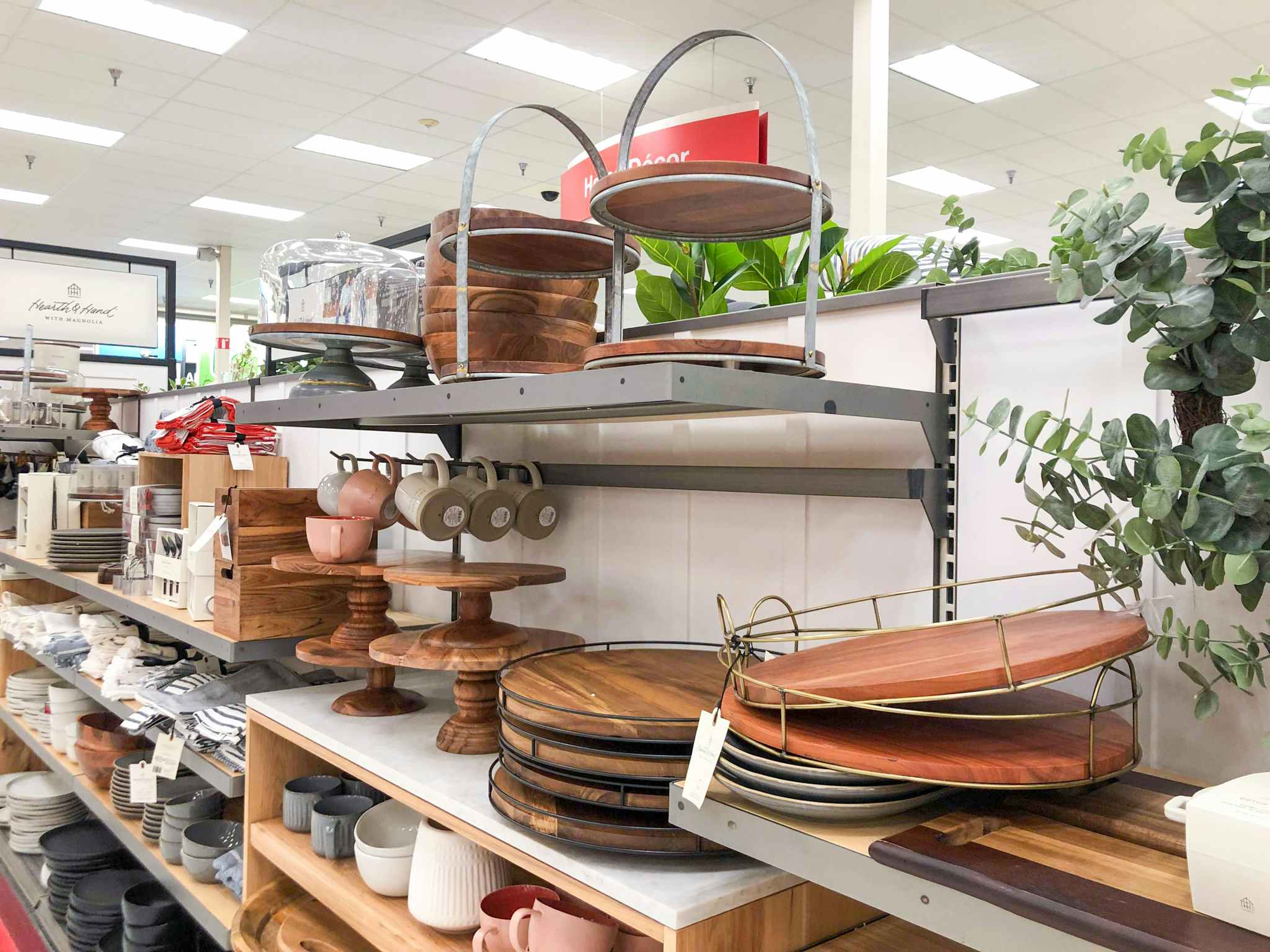 Display of kitchen items, including Lazy Susan's and tiered trays at target