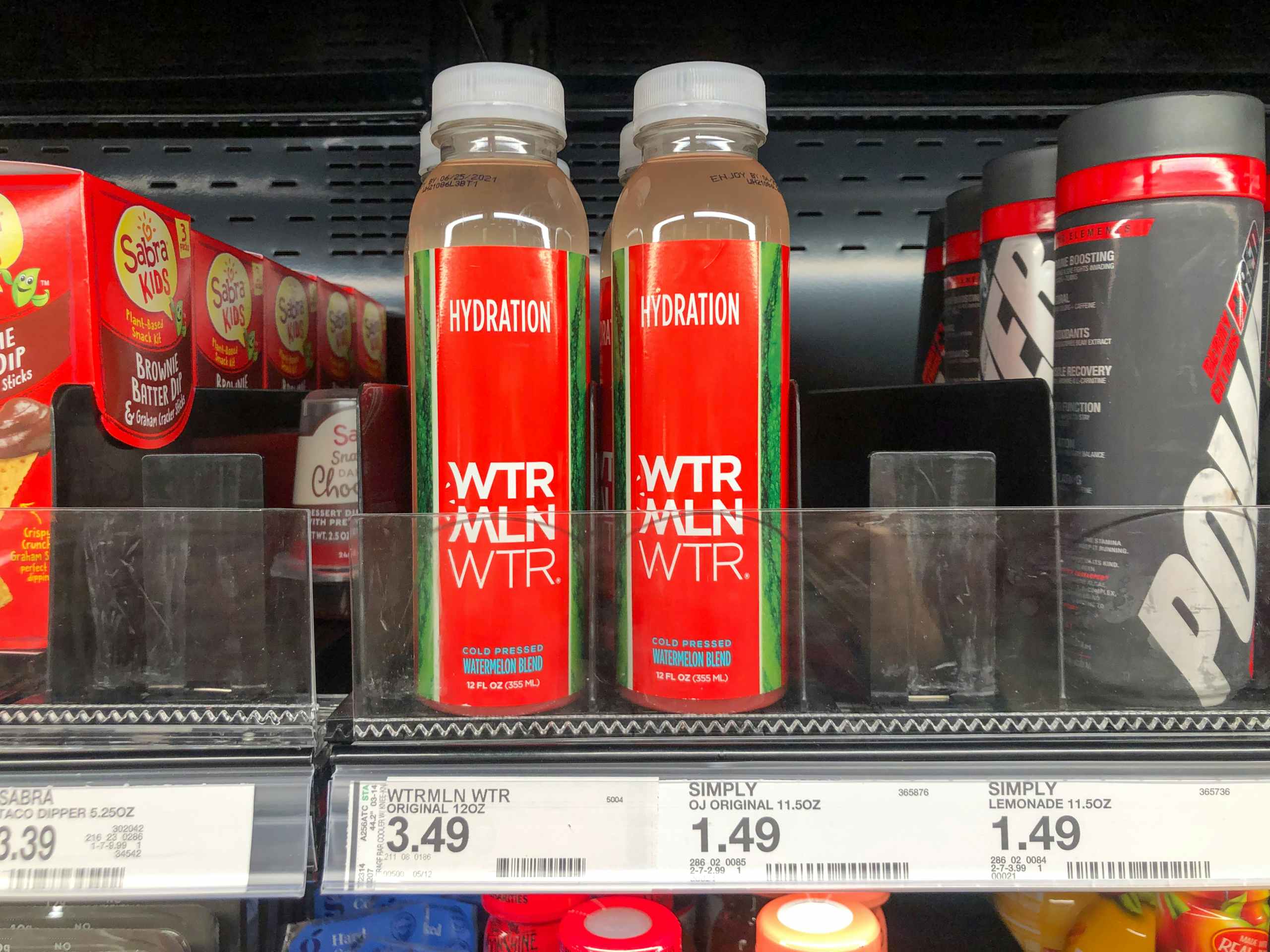 shelf of watermelon bottled water