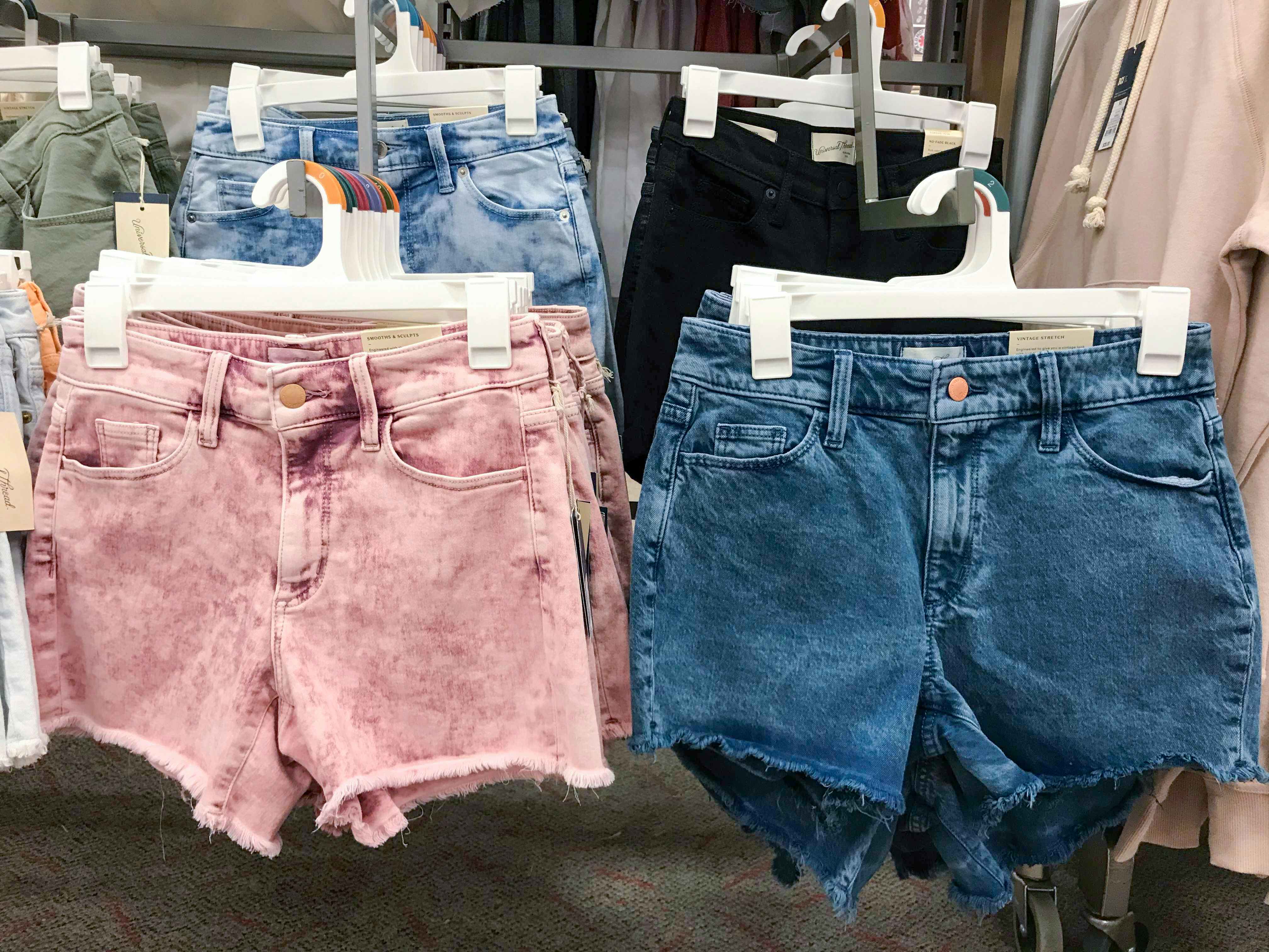 denim shorts on hangers