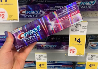 Crest 3D white toothpaste next to a yellow sale tag indicating the price as $4 until May 29