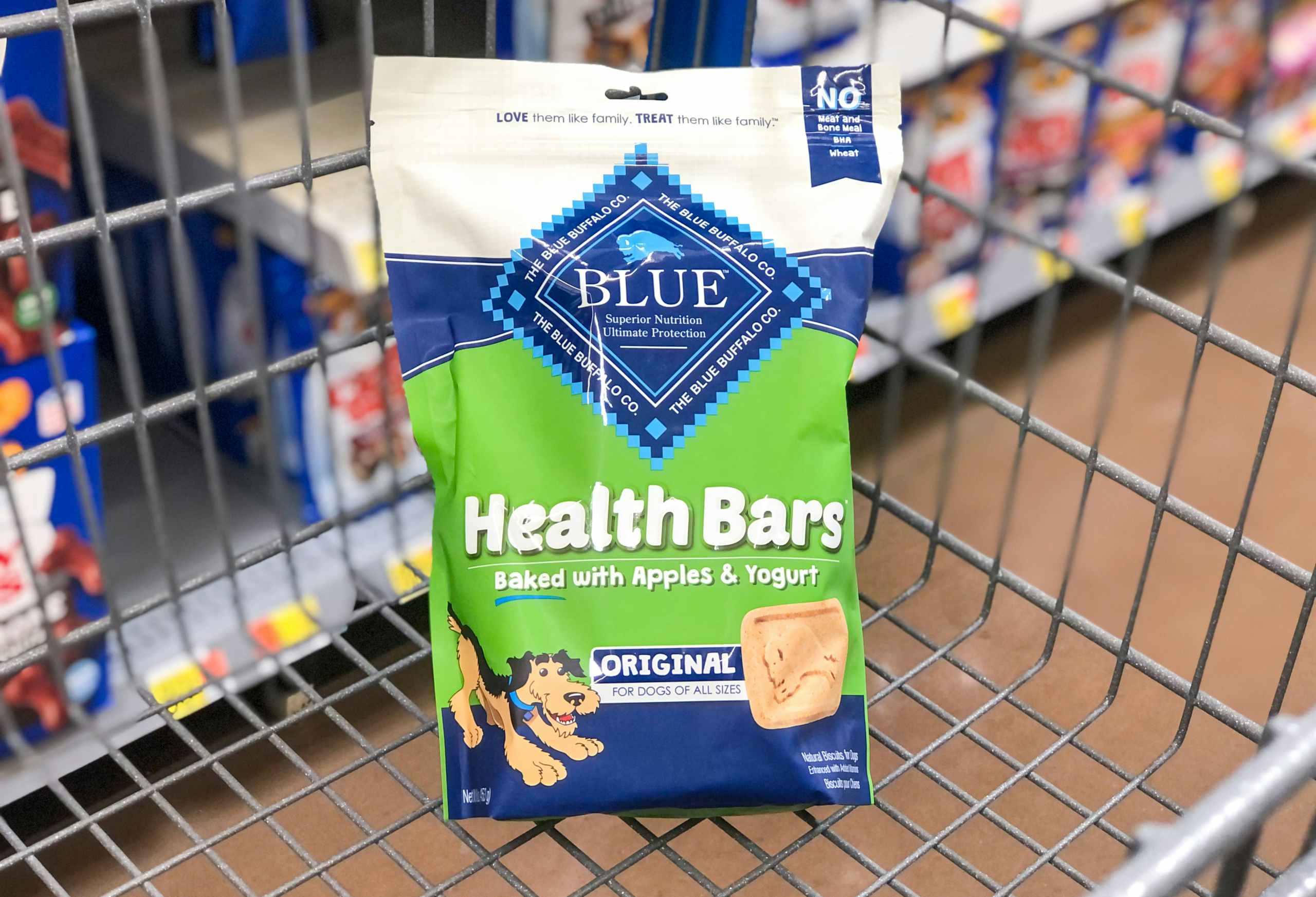 bag of dog treats in shopping cart