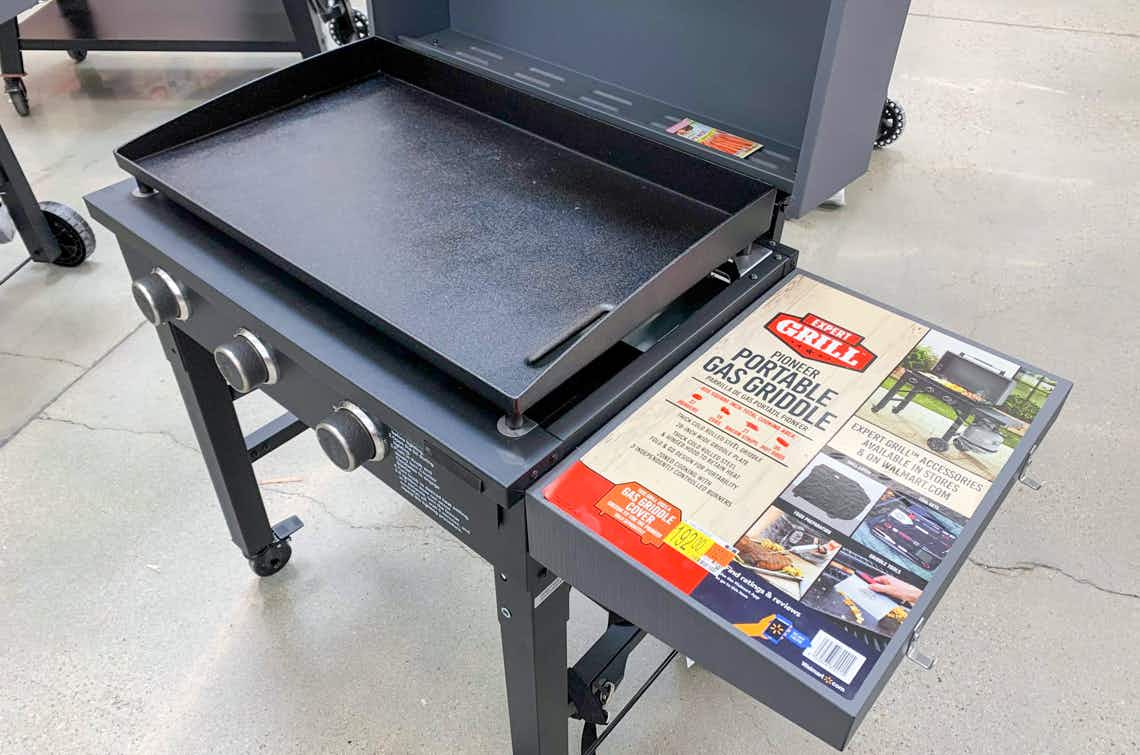 close up expert grill pioneer protable propane gas griddle product specs the bbq grill is open with the griddle as the focal point