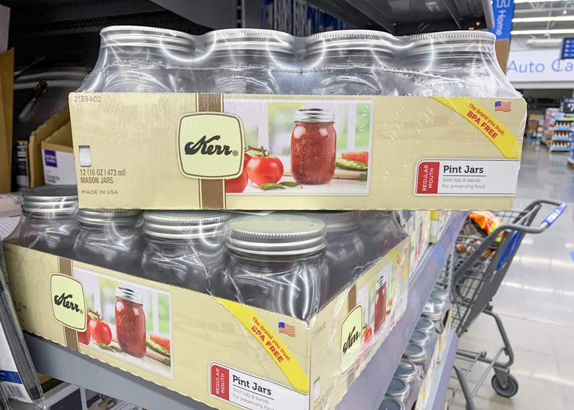 box of 12 kerr pint sized canning jars sitting on a shelf at walmart