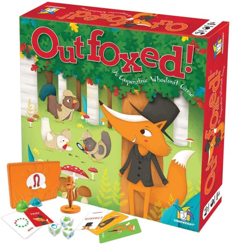 The Outfoxed board game with a few playing pieces placed in front of the box